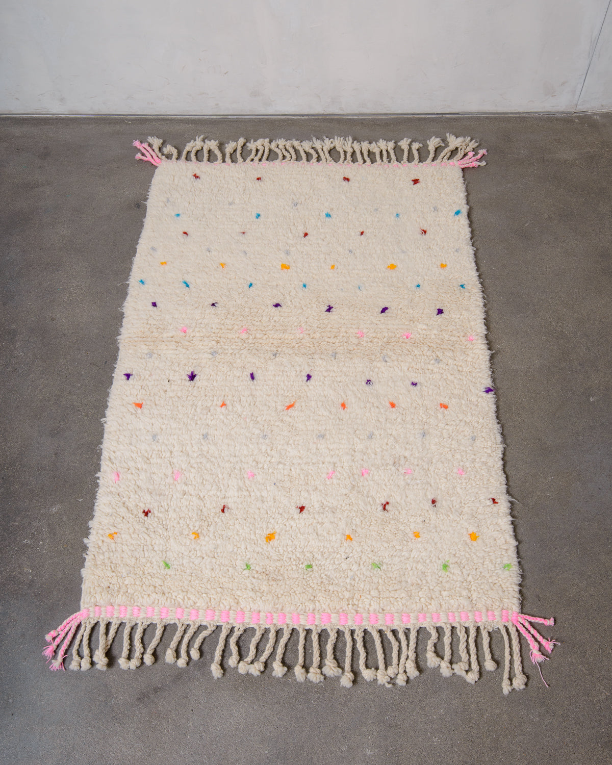 Modern, designer, handcrafted Berber rug from Morocco. Beniourain carpet with beautiful colours and patterns and fluffy wool texture.